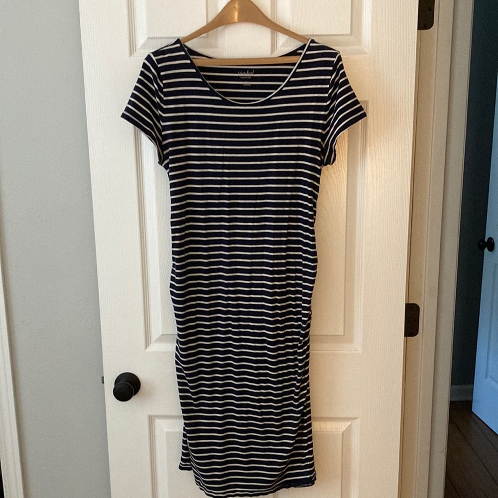 Knee length maternity dress.